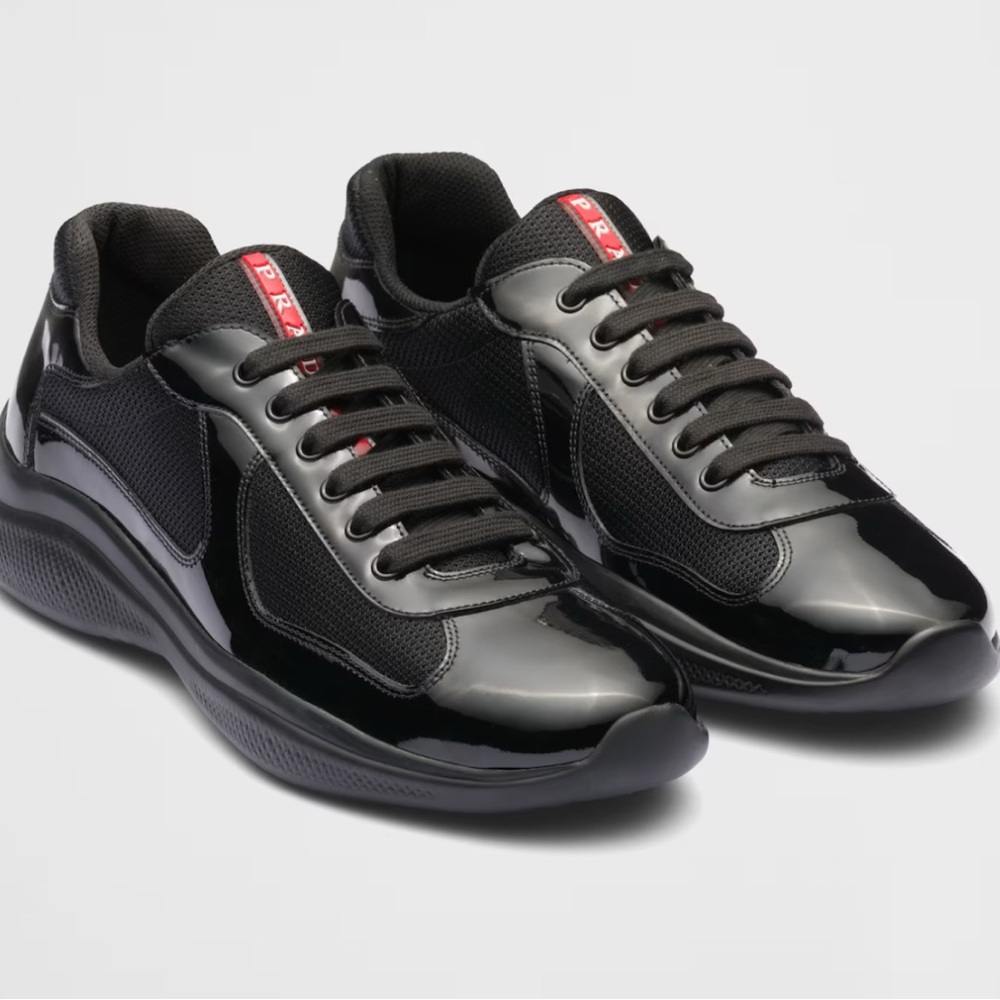 Prada Glossy Black Sneakers with Red Accents